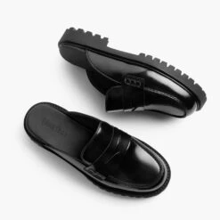 Penny Mule | Black -Casual Shoes World 1024x1024 Women PennyMule Black 102324 FlatlayAlt e5fd7f97 cae9 4dce b43f 281aedf92ebc